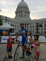 Completing the final stage of the 2011 Tour of America's Dairyland in Madison, Wisconsin after a cool-down lap with my kids on their scooters.
