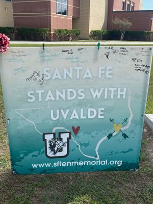 A large message board erected next to the Santa Fe memorial conveying messages (not pictured, quite personal, on the back) of empathy and hope to the families of victims in the Uvalde school shooting.