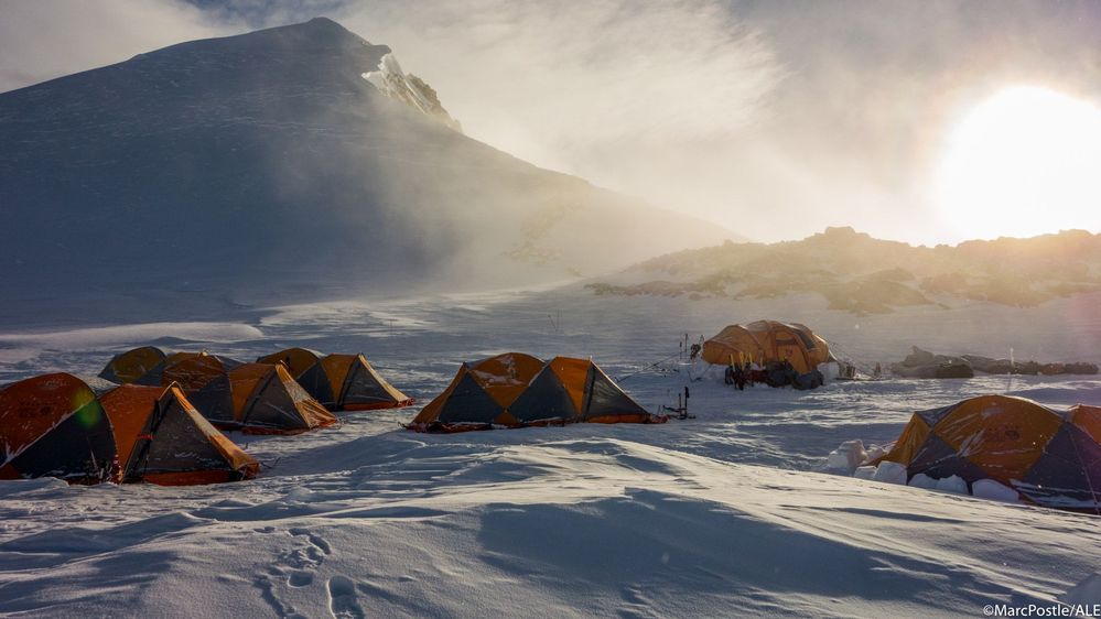 Tents pitched on the snow at high camp by Vinson Massif. Image by Marc Postle