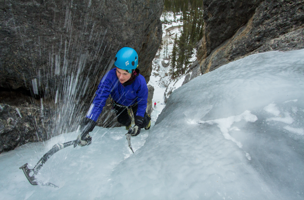 woman ice climbing, photo by Tim Banfield