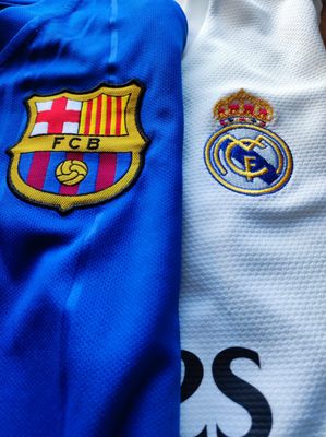 FCB shirt on the left and RM shirt on the right
