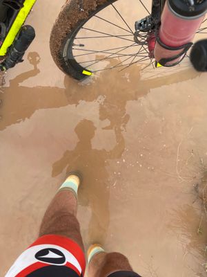 Finding enough water to clean off the last mud ... in the Separ Desert. What a strange weather year for the Tour Divide!