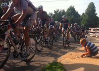 My son playing in the dirt next to a very SLOW uphill corner in the Sunday Crybaby Hill stage of the 2012 Tulsa Tough weekend. Cycling legend Steve Tilford (RIP) pictured with jersey unzipped.